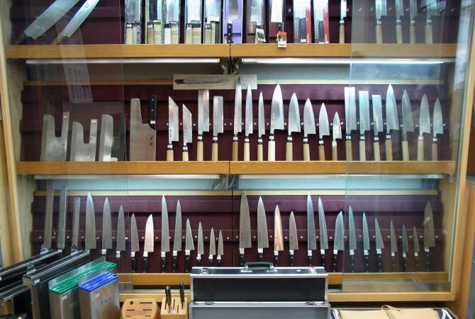 Display of knives and cleavers of various kinds